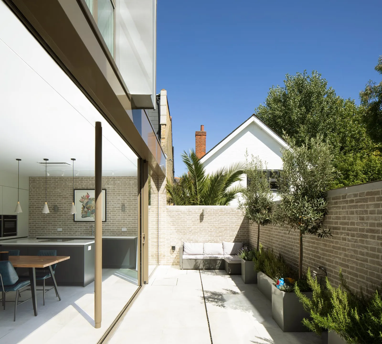 Courtyard garden with sliding glass doors onto the kitchen