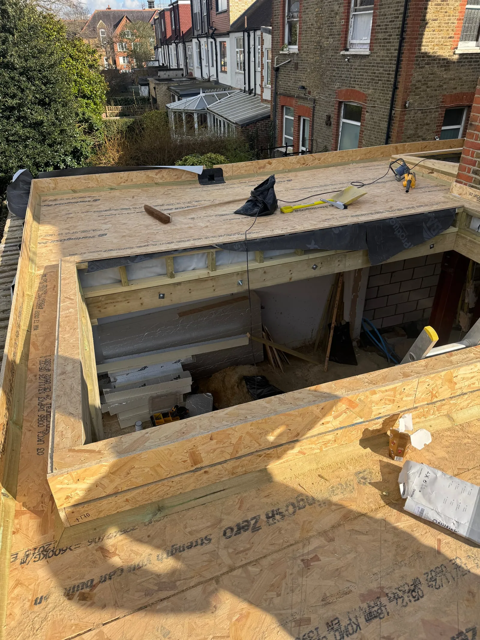 Aerial view of the roof deck under construction, insulation visible