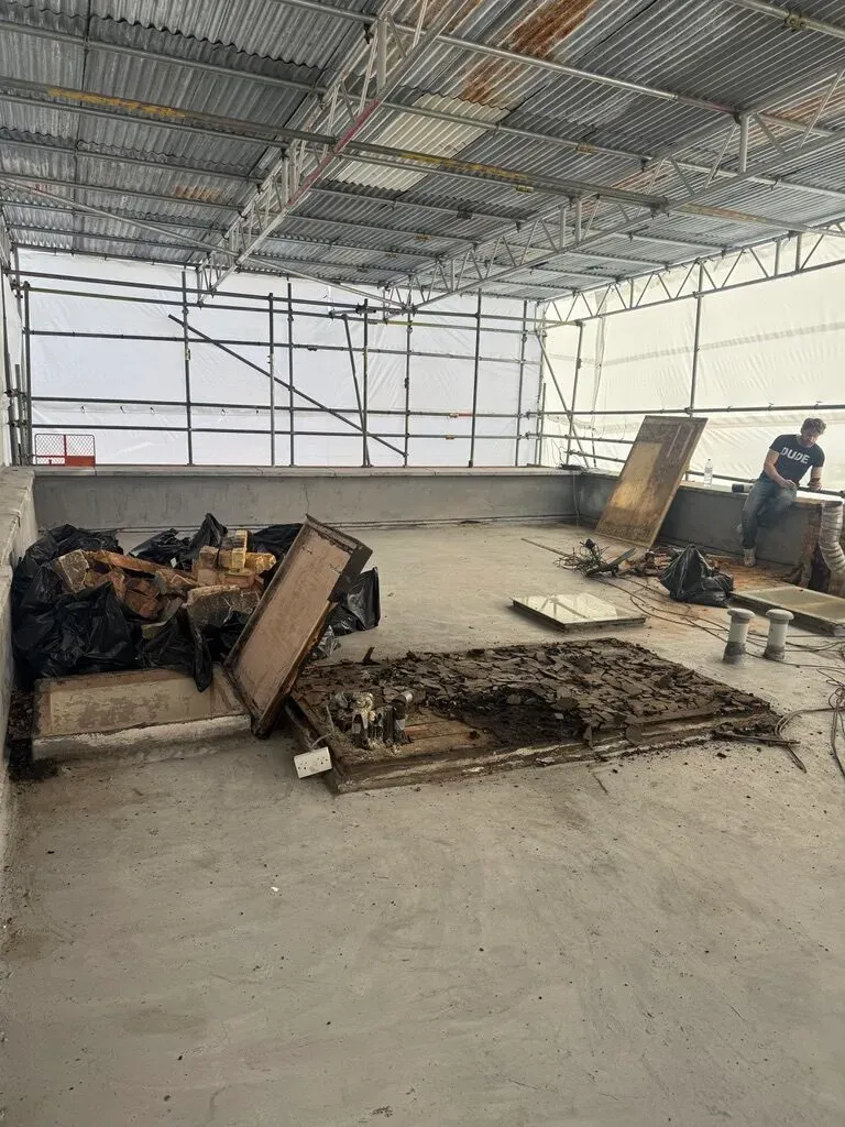 The roof terrace stripped back to the deck before rebuilding and re-waterproofing